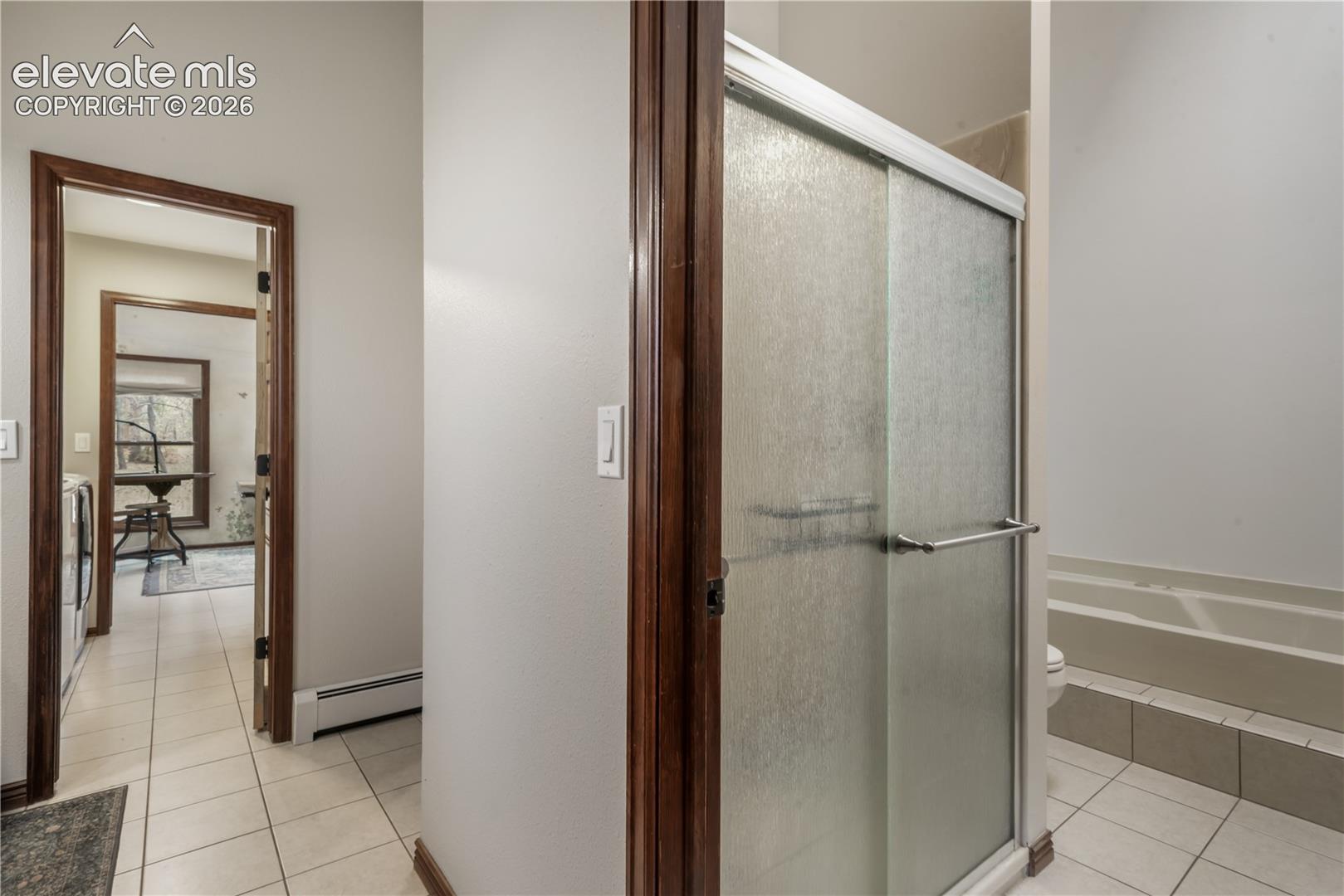 Large soaking tub, shower and skylight