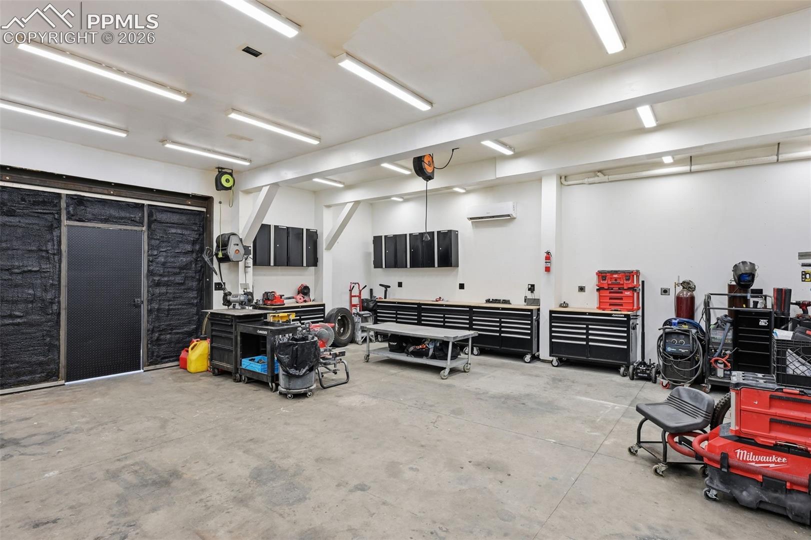 The garage is complete with heating and AC, and spray-in foam insulation for comfort all year long. 