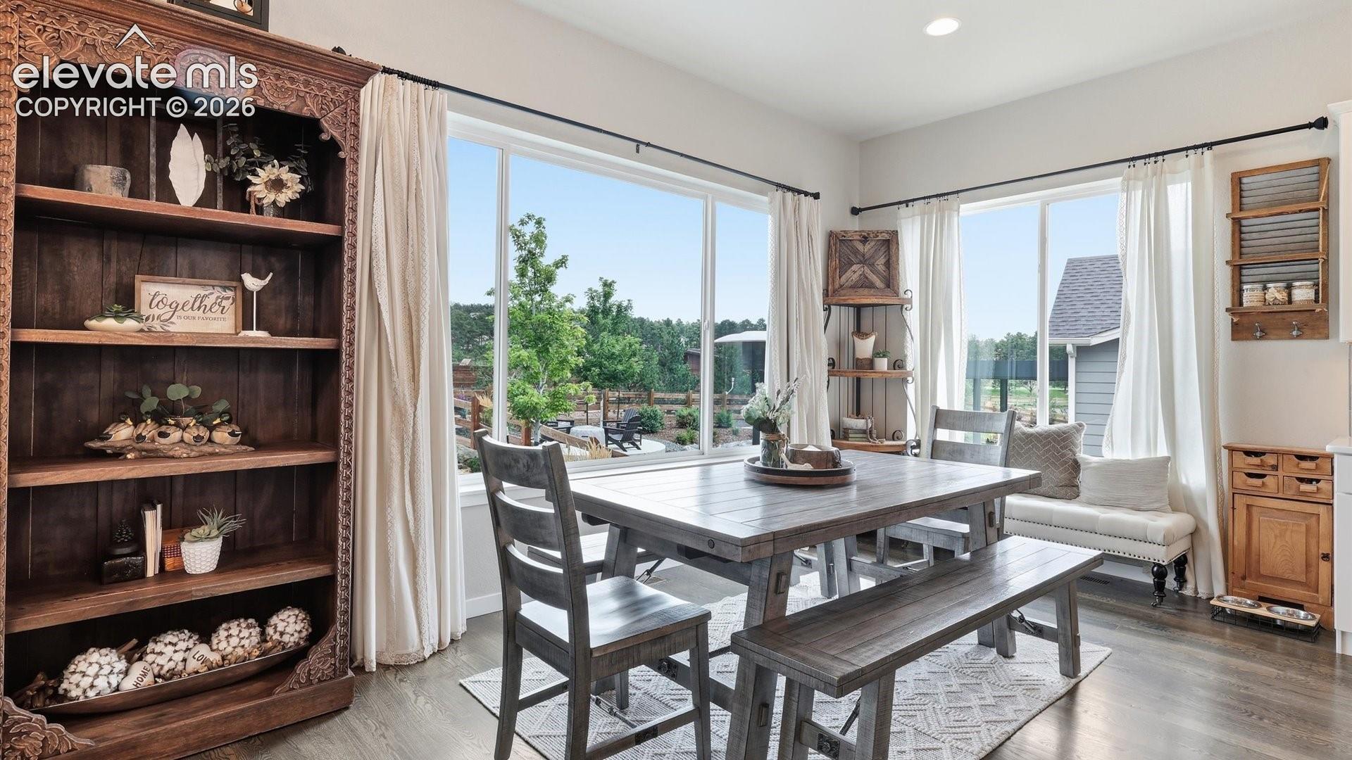 THE PERFECT BREAKFAST SPOT — Start your mornings surrounded by natural light and picturesque views from the expansive windows.