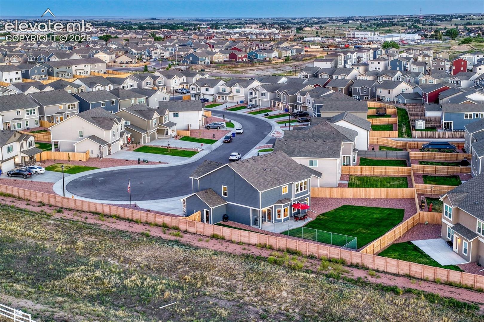 Amazing location with large acre property behind