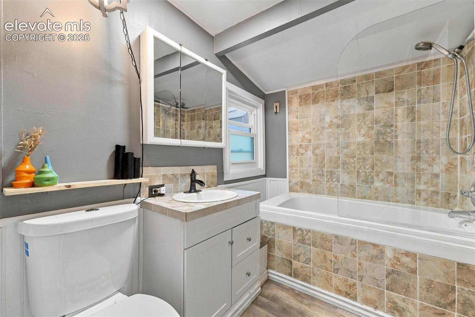 Bathroom with jetted tub and shower.