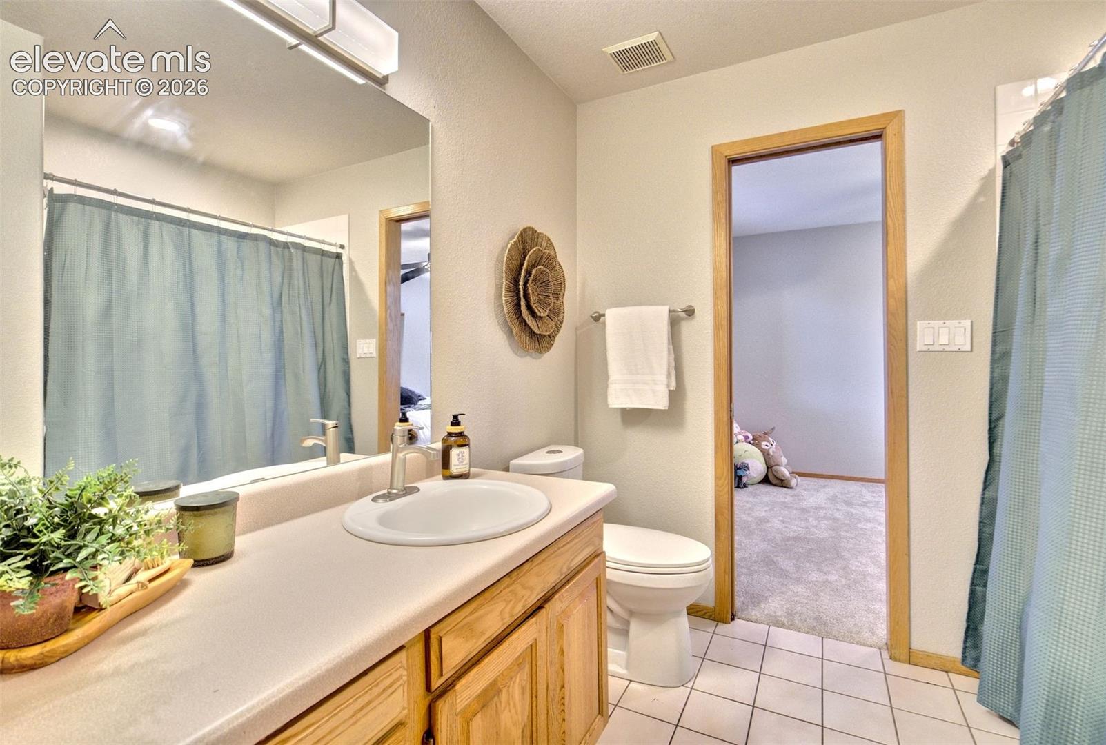Full bathroom- Jack n Jill between second and third bedrooms- main level