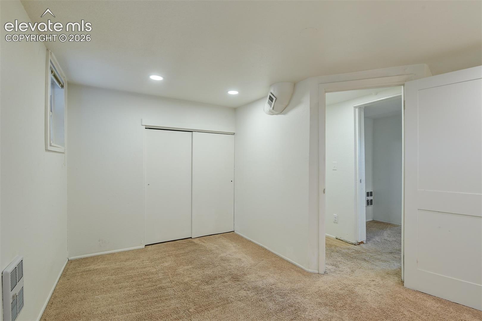 Basement unit located in the back of the property 