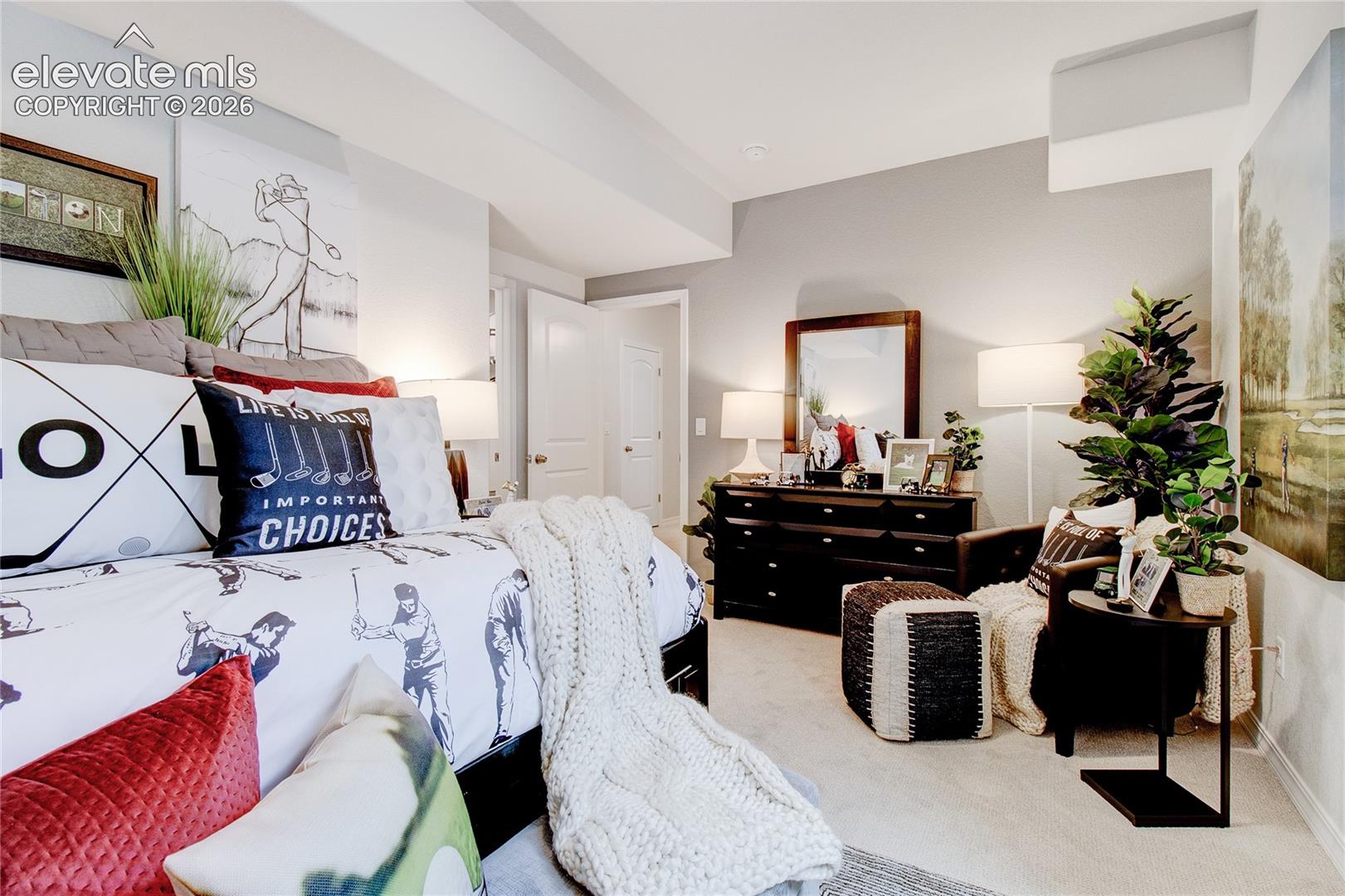 Neutral interior space featuring neutral wall paint, carpeted flooring, and standard interior doors