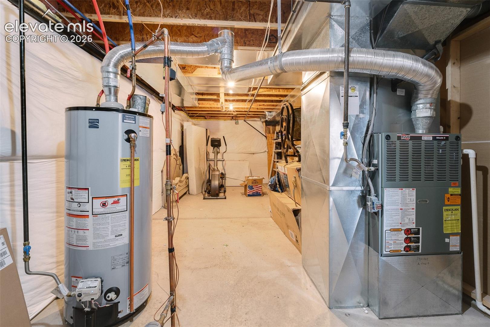 Large utility room with space for additional storage.