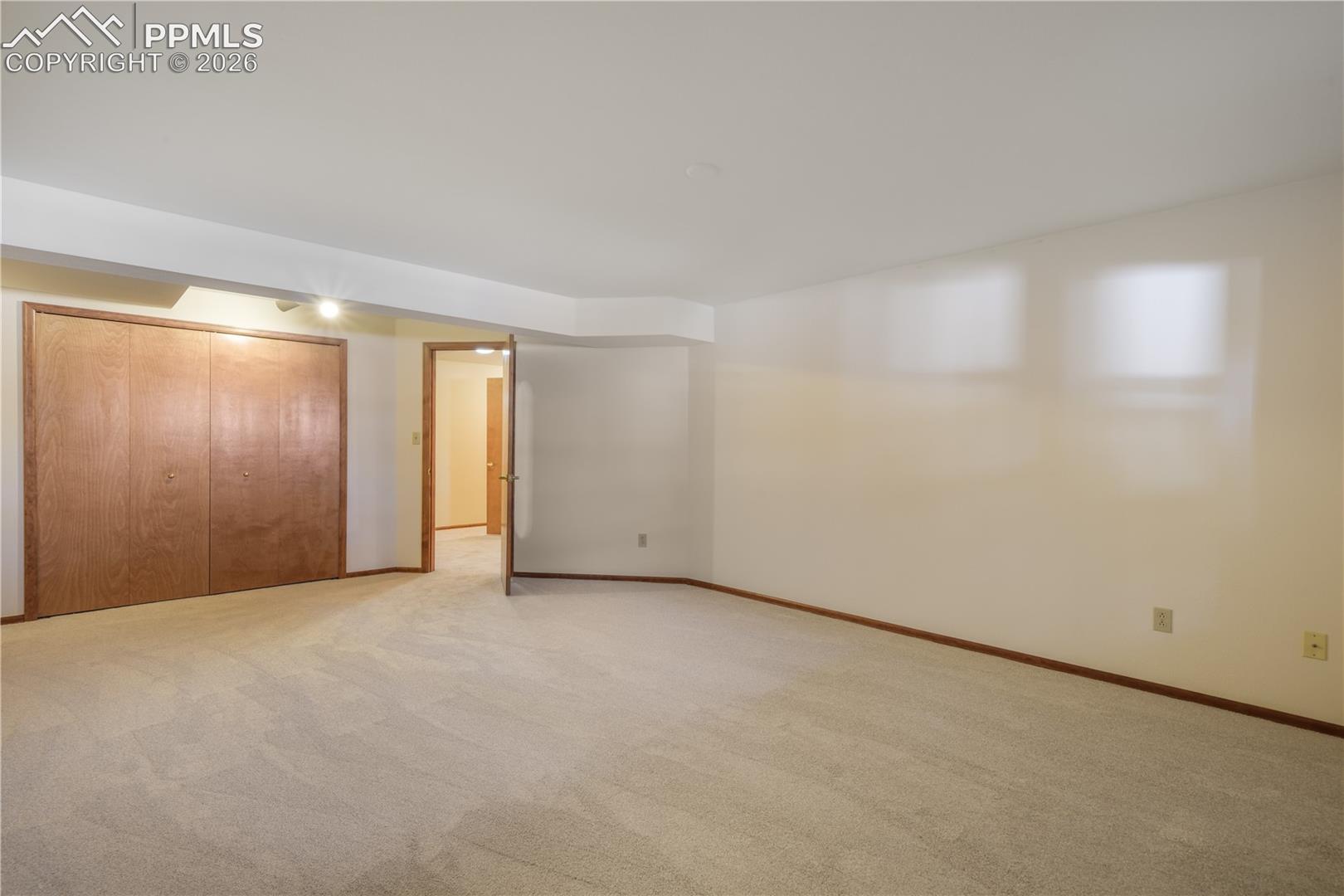 Basement 3rd bedroom with new carpet