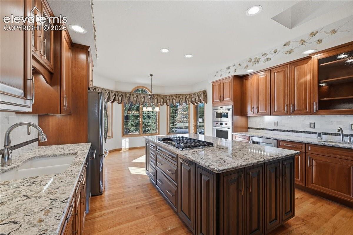 Gas cooktop within the primary island creates a great flow through the kitchen and a comfortable place to gather. 