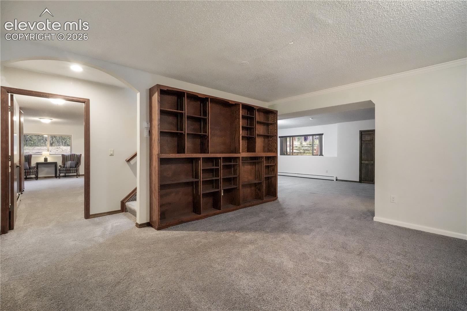 Expansive basement with built in shelving