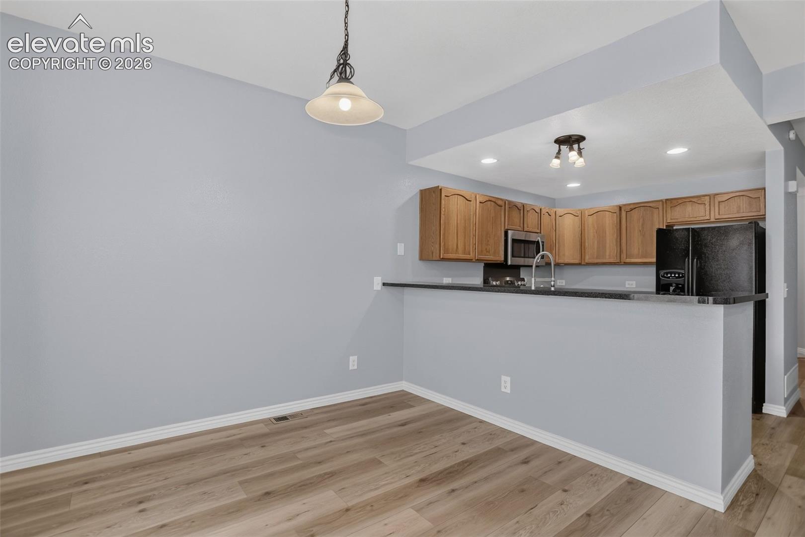 Dining area includes bar counter seating