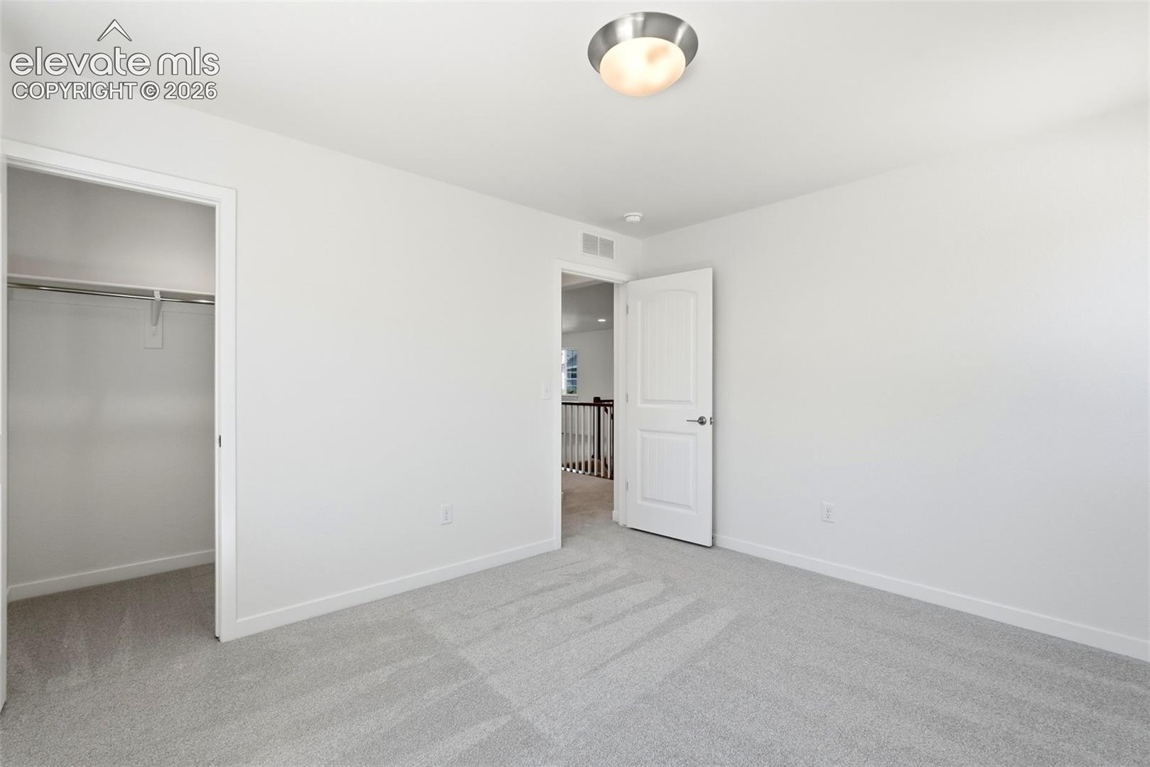 Bedroom 3 located on the upper level