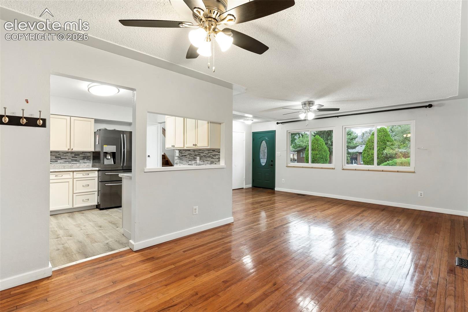 Hardwood flooring throughout the main living area