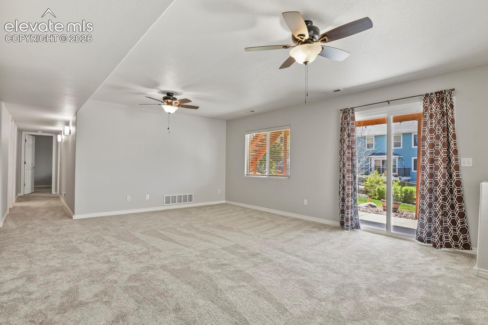 Walk-out to backyard and covered patio