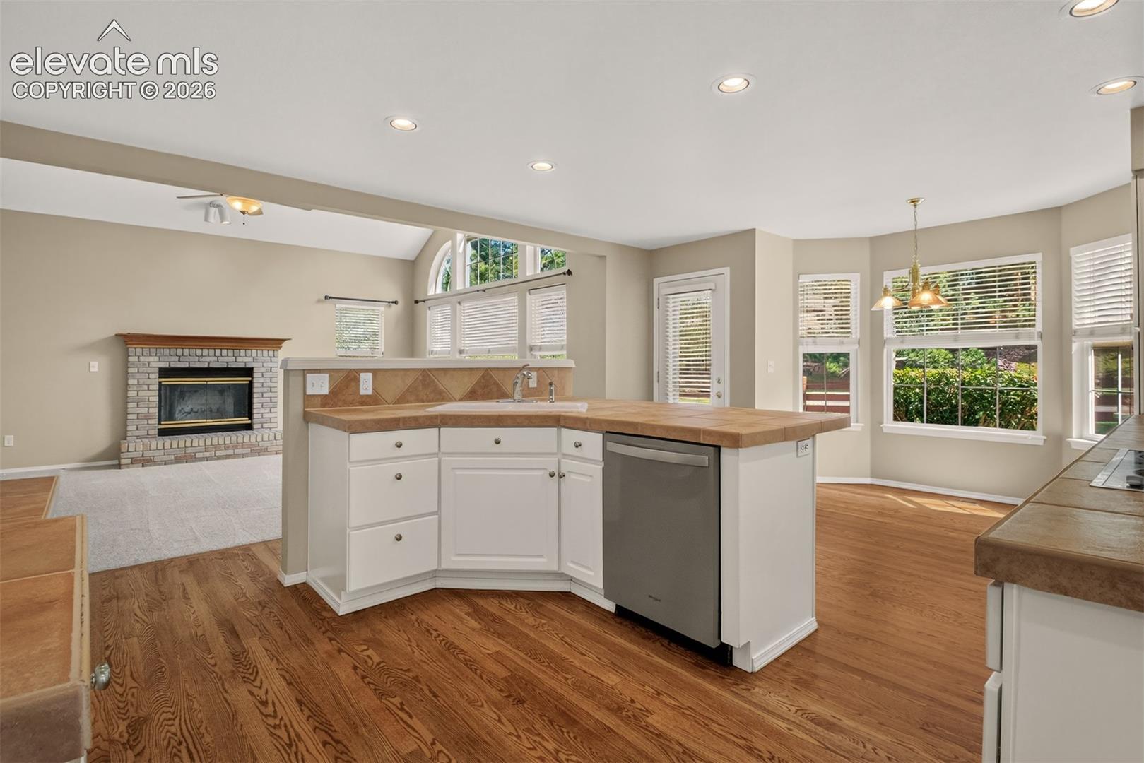 Open Kitchen, Island, Breakfast Nook, Opens To The Family Room. 