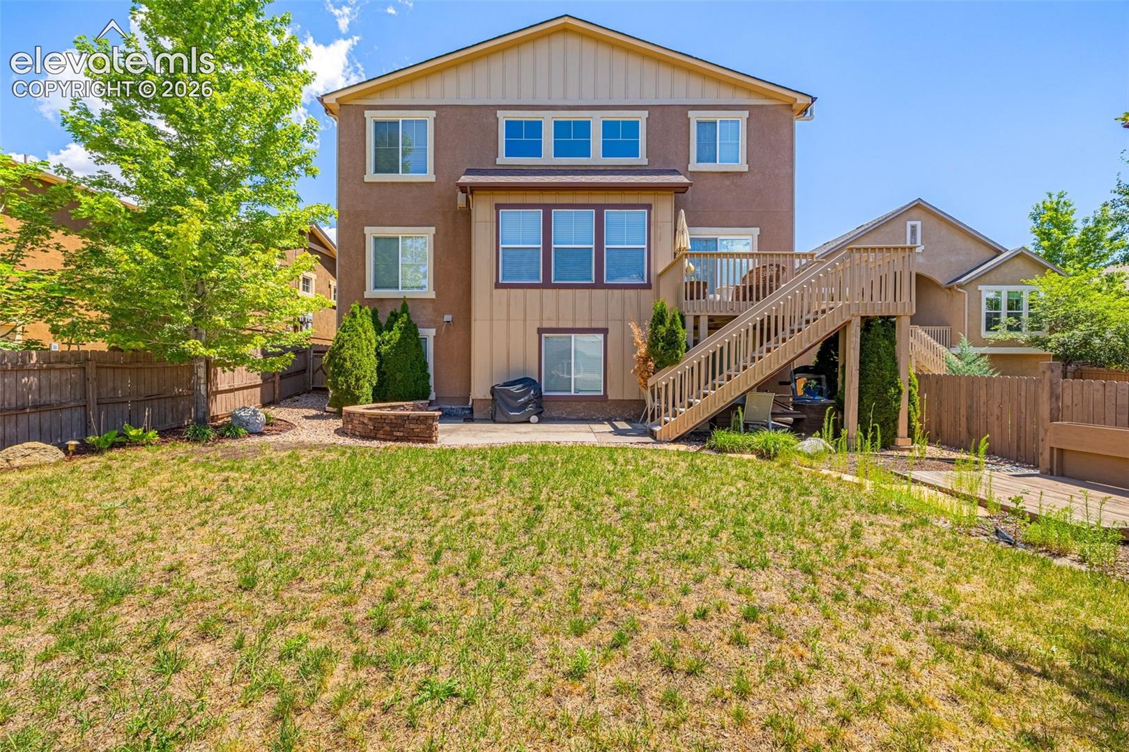 Large deck offers a great place to sit and watch the weather come over the mountains, lower level patio offers plenty of space for entertaining and conversations. 
