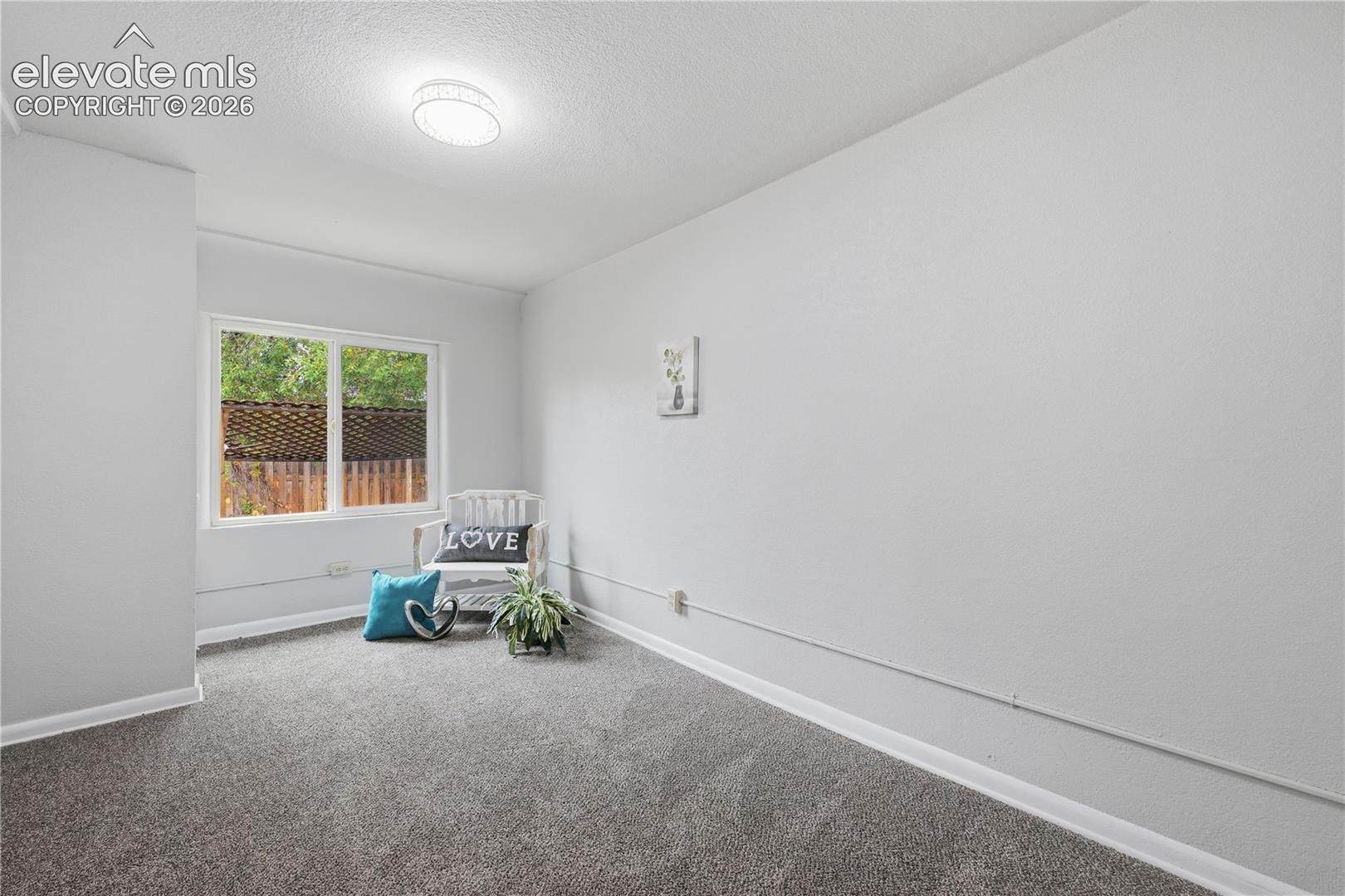 Another secondary bedroom with the main house. 