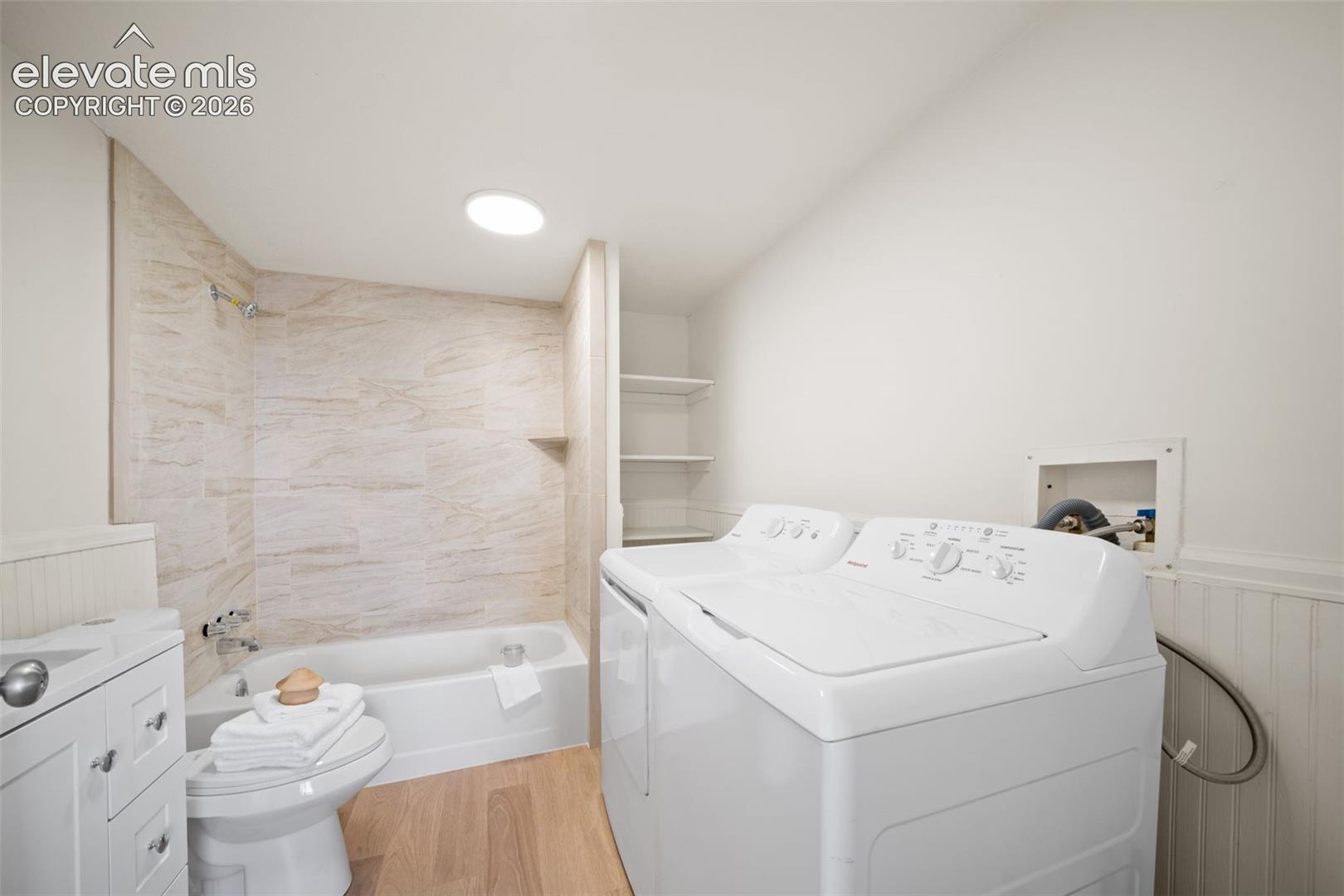 Updated bathroom with laundry area