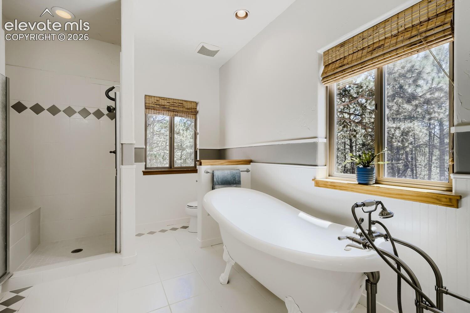 Full bath on main serving guests and secondary bedroom