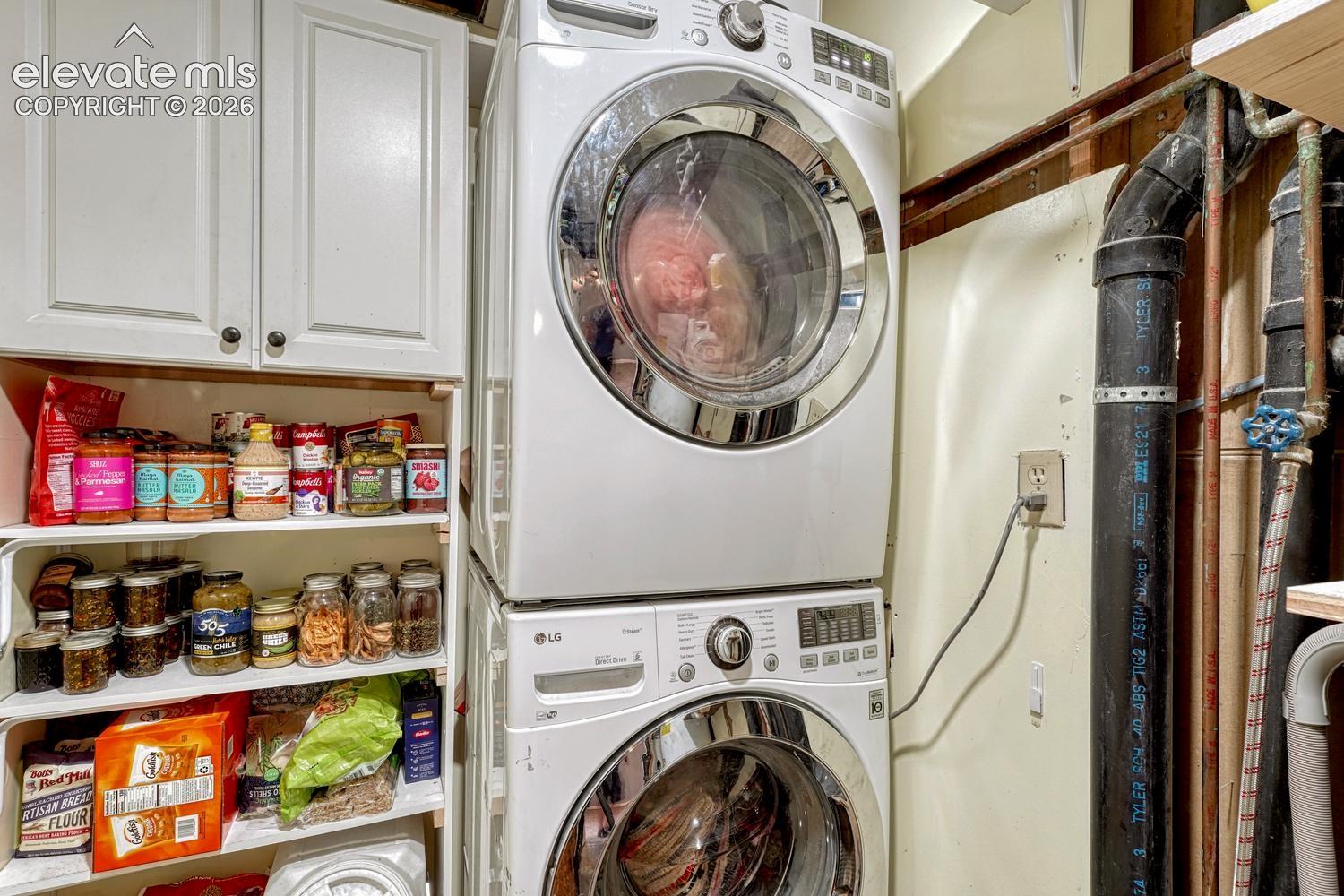 The Laundry Room has storage cabinetry, & the washer & dryer are included. 