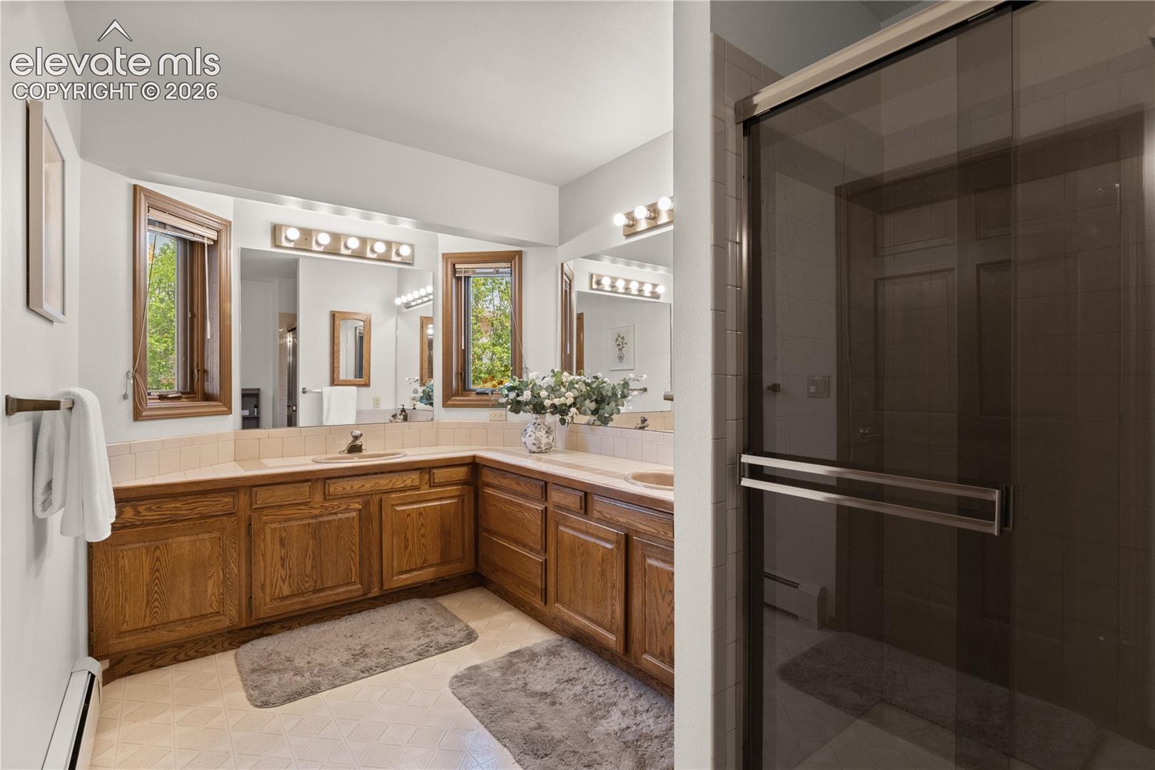 Master bathroom is spacious and bright.