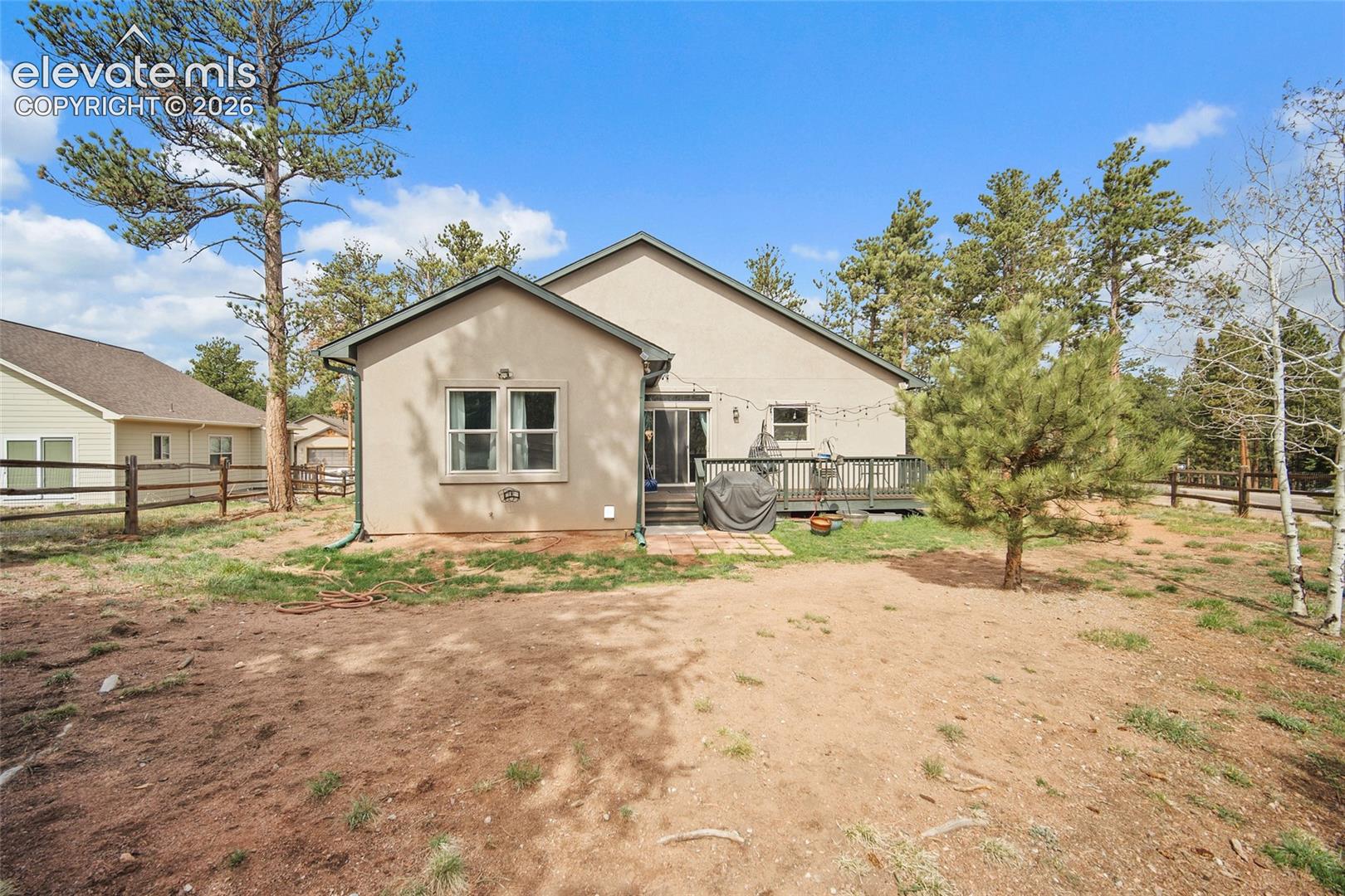 Back of the home and yard