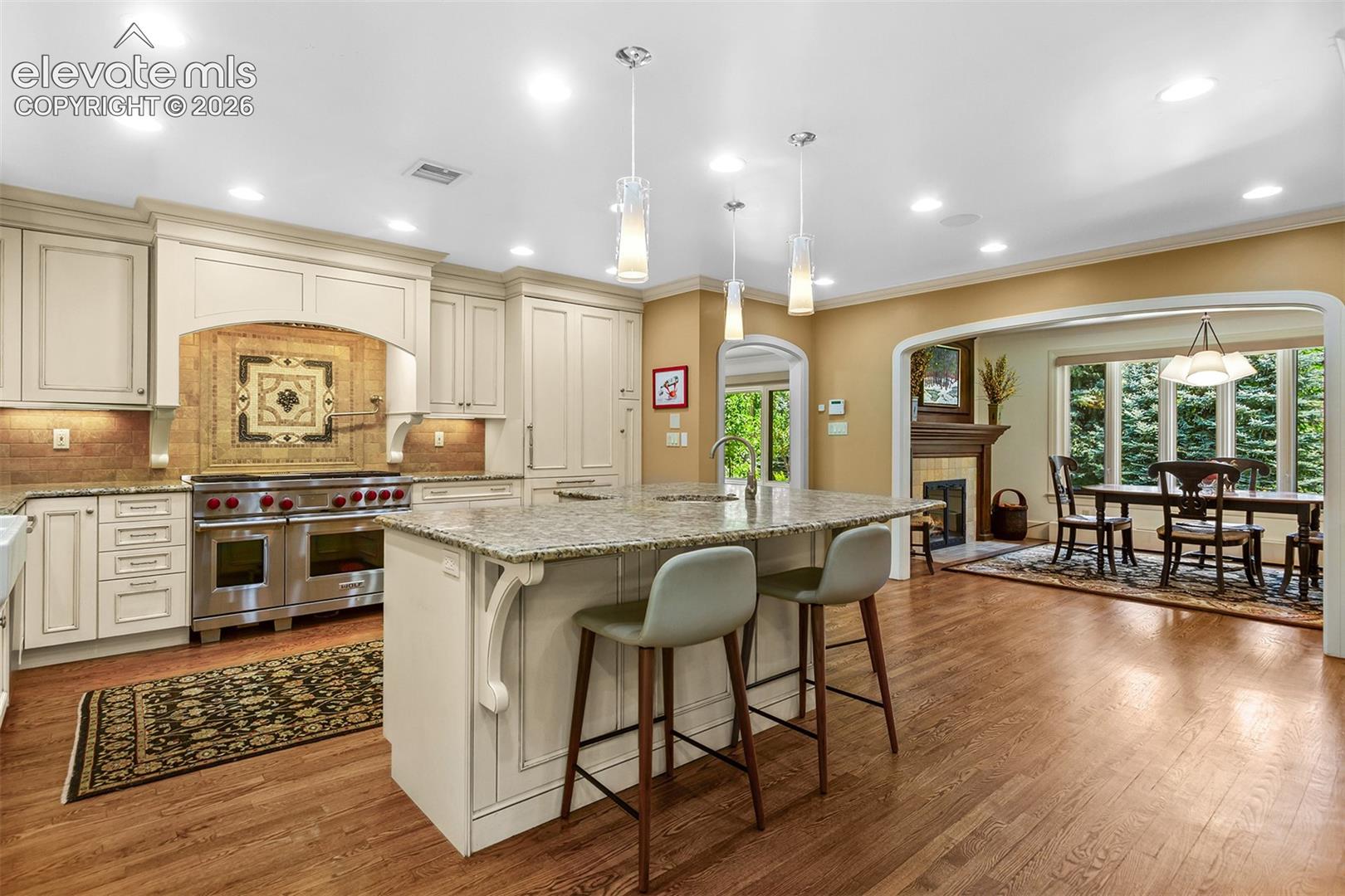 Expansive kitchen opens to informal dining area.