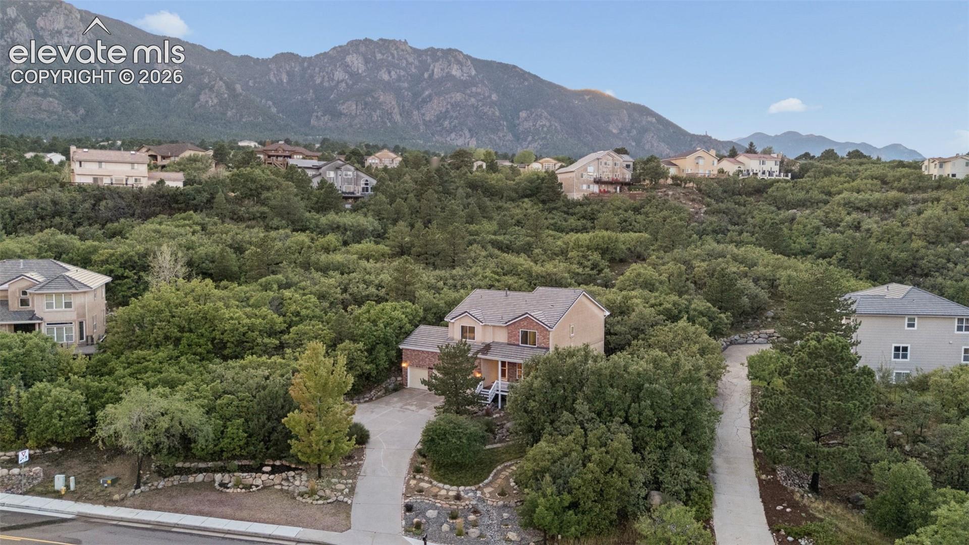 Extensive space behind home provides a privacy buffer in back yard 