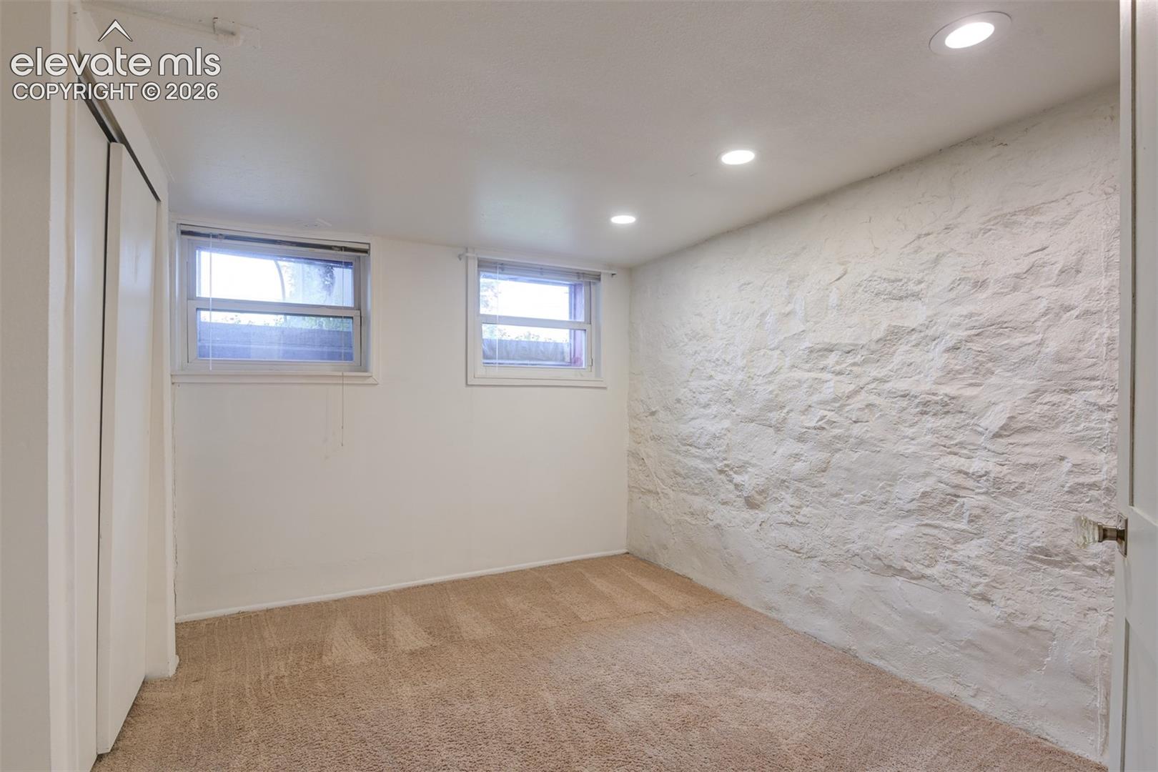 Basement unit located in the back of the property 