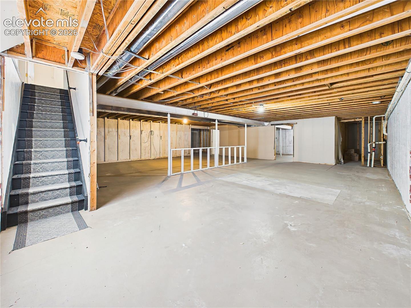 Full unfinished basement offers exceptional square footage and potential for future finished living space while maintaining ample storage.