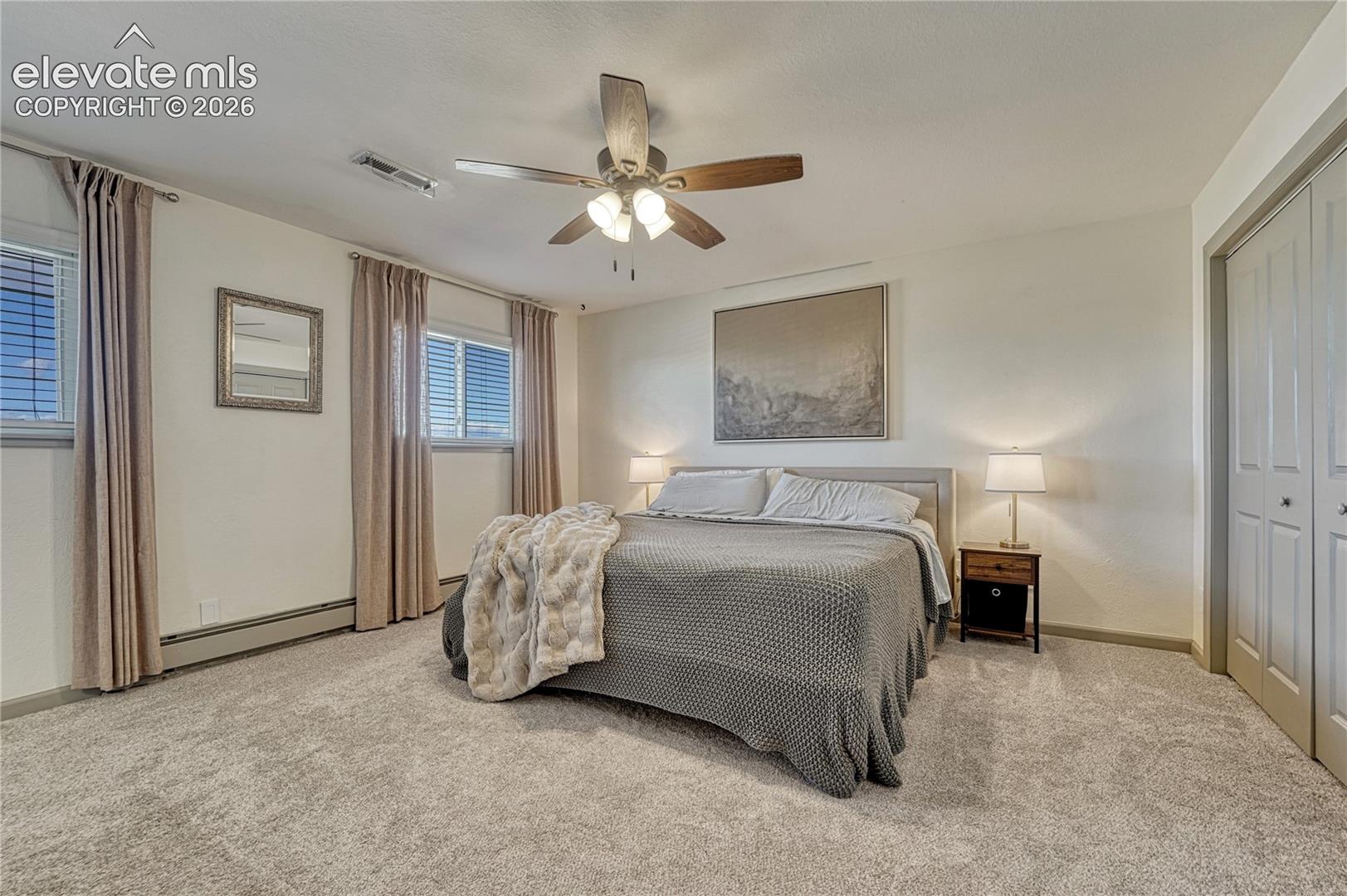 Primary bedroom easily fits a King size bed!