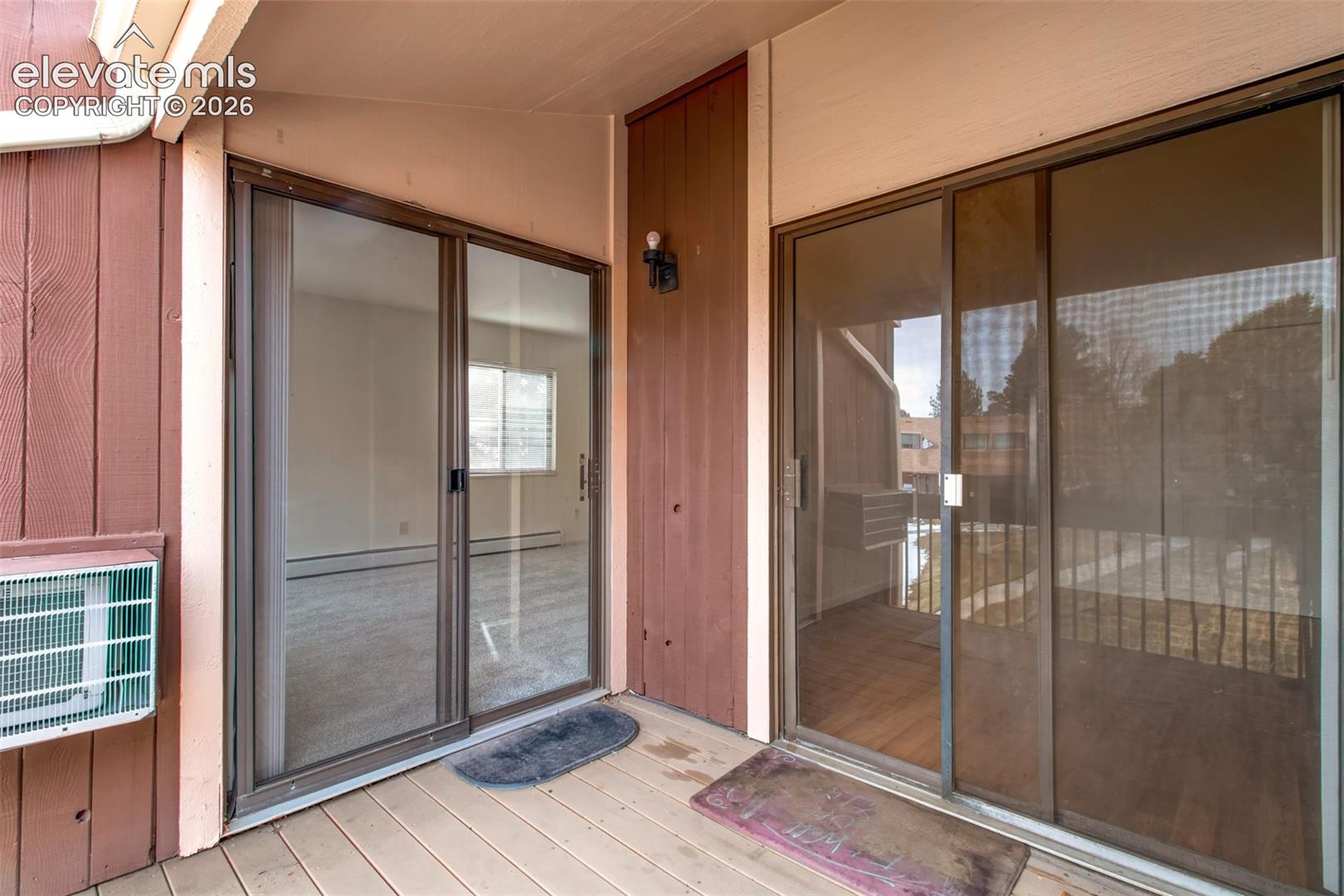 the deck has two sliding glass doors
