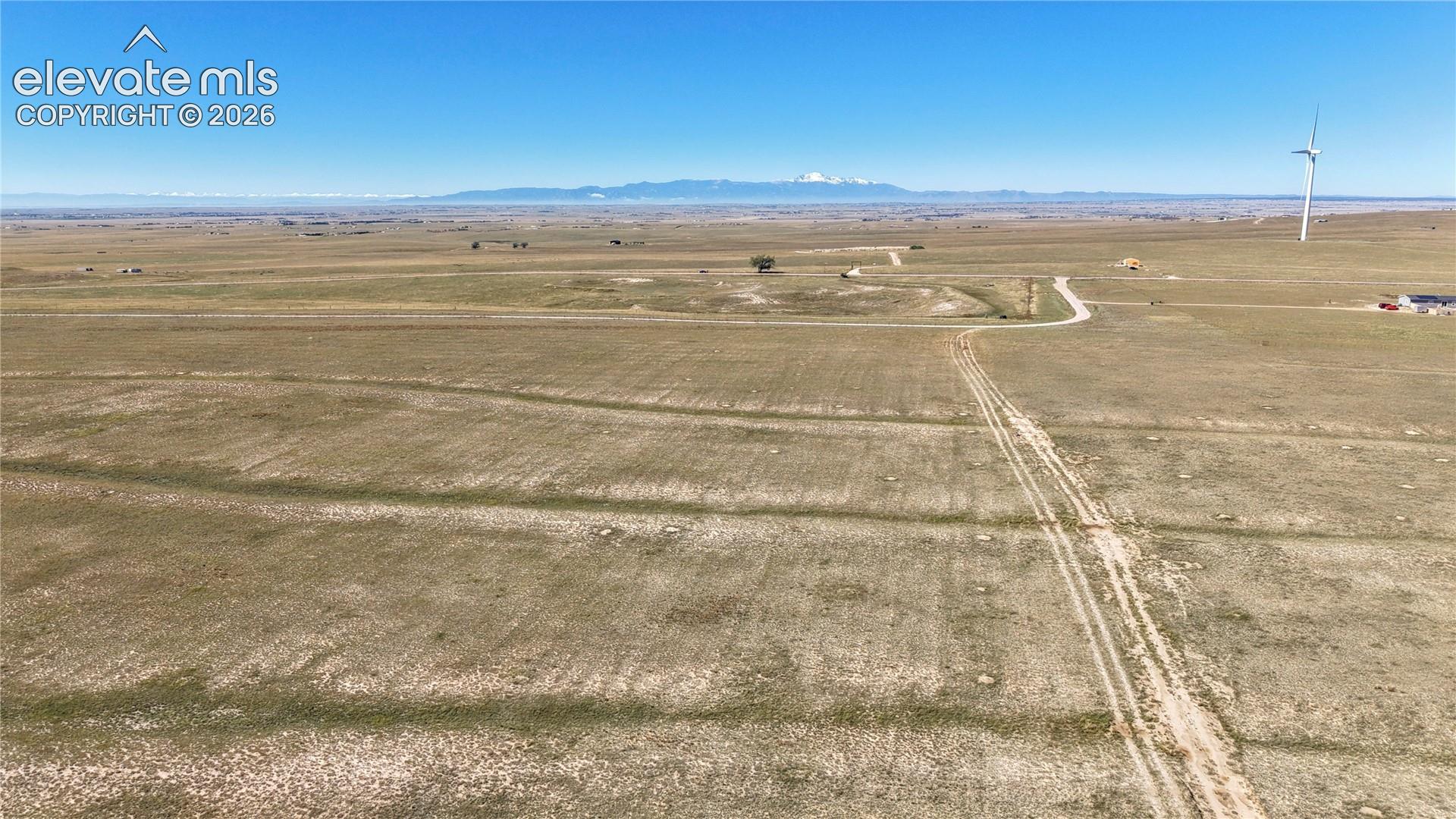 View of lot: Neighboring home to the North, lot is to the right. 