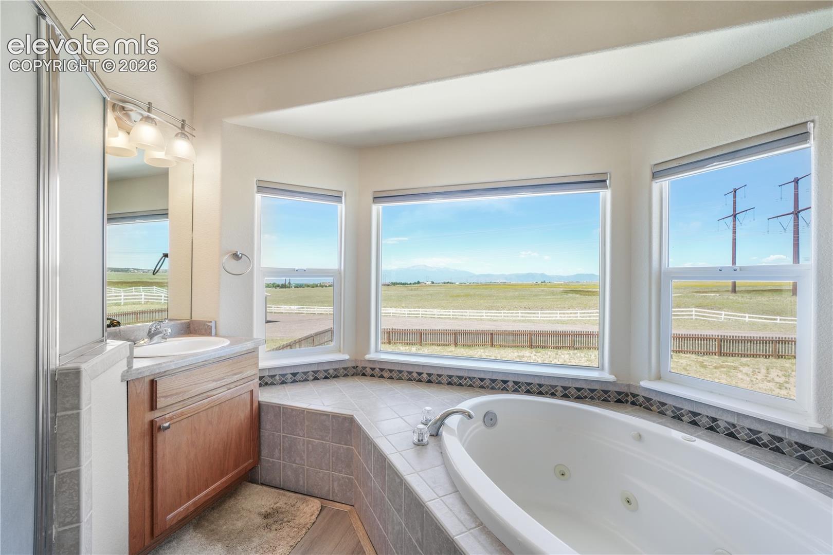 Separated Vanities, Jetted Tub and Stand Alone Shower