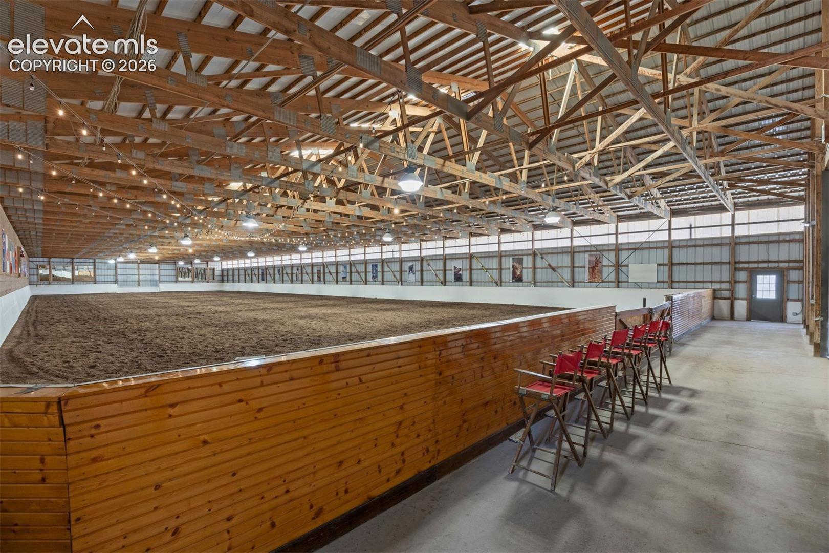 An exceptional 200-foot by 70-foot fully enclosed arena with all-organic footing, and a viewing area. 