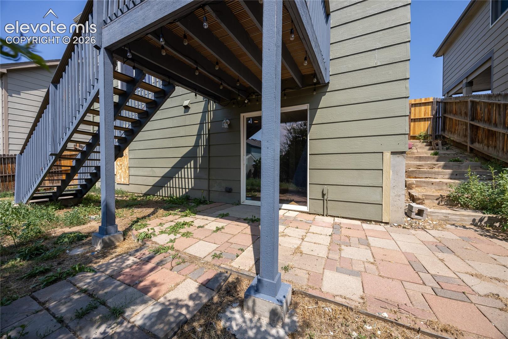 Lower level patio space with paver flooring