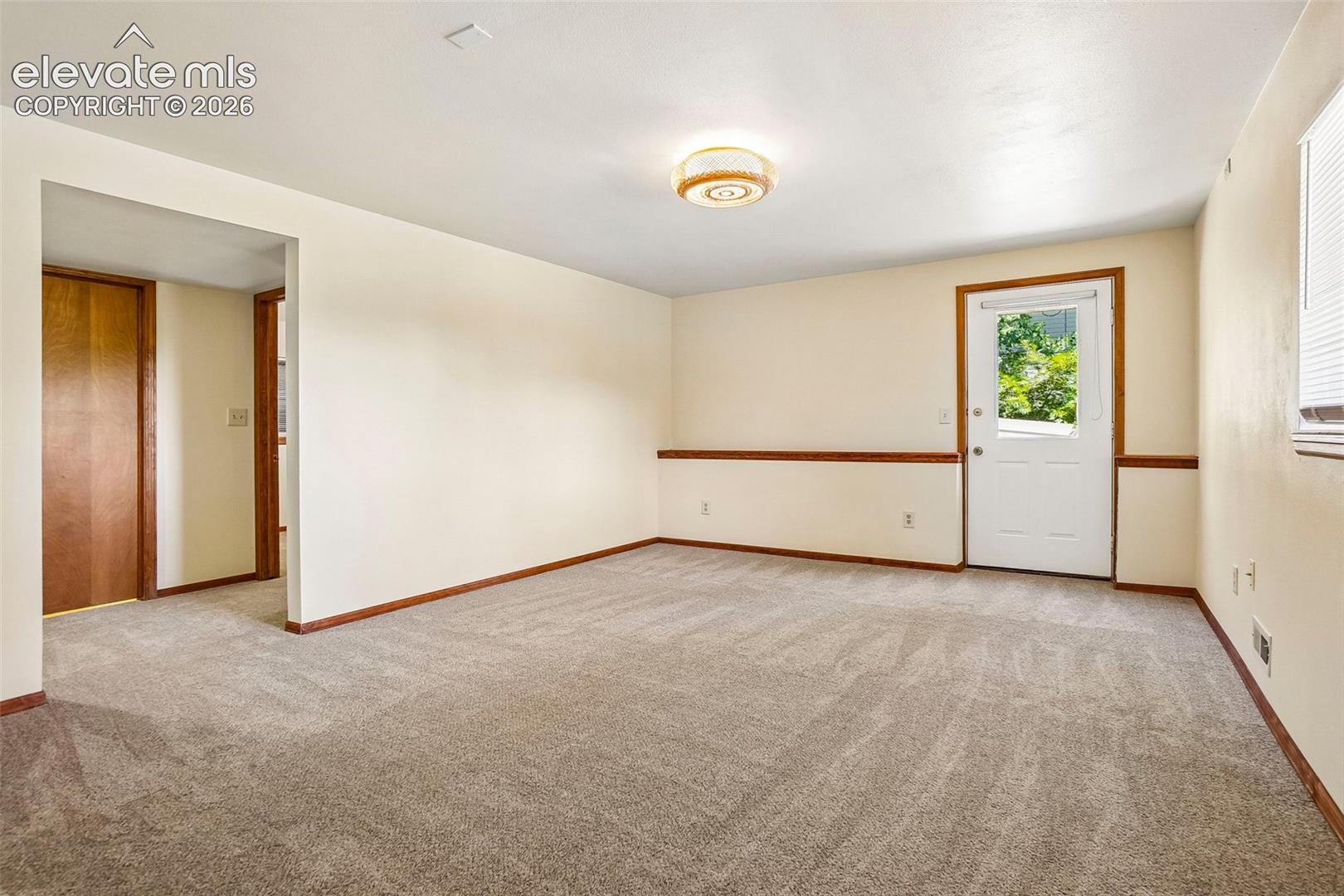 There is another large living space in the basement, with its own outdoor access! 