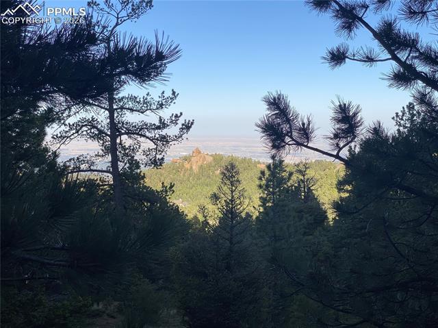 Build site looks at Colorado Springs Down below! Derby Rock is the formation in center of the picture.