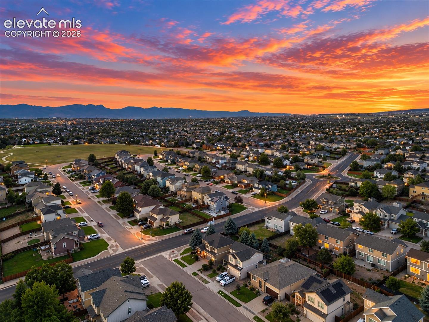 Sweeping mountain views frame the neighborhood, with the nearby park just moments from home for play, recreation, and time outdoors.
