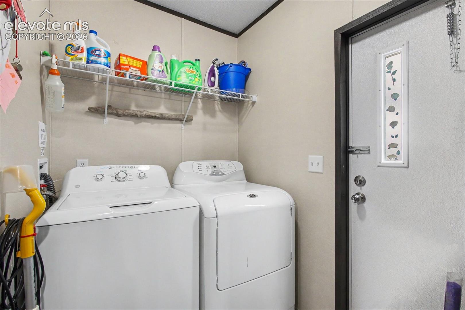 2nd Home: Convenient laundry room with a walkout.
