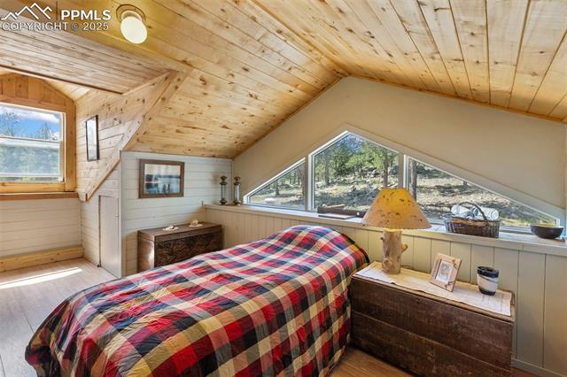 Loft Bedroom with closets and eaves storage. 