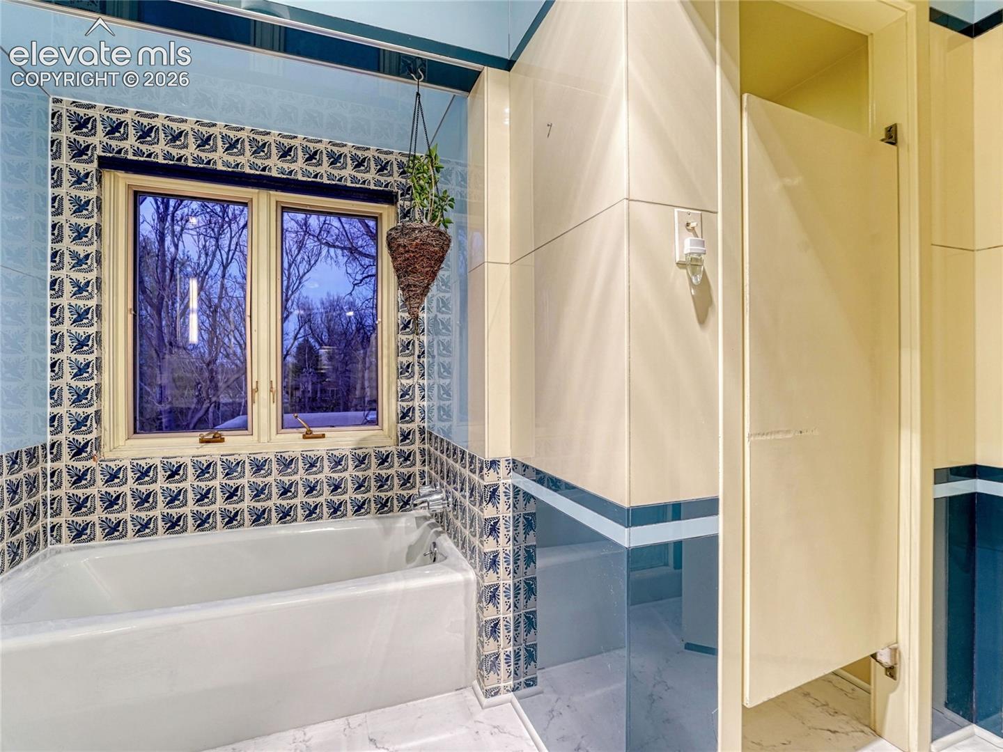Original handpainted and Vitrolite tile.