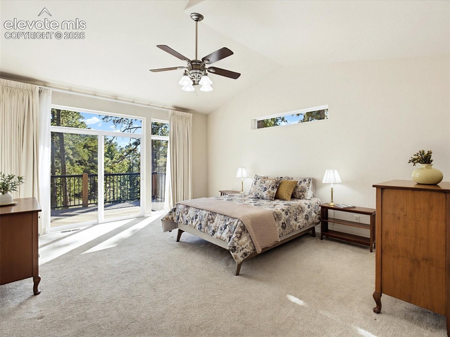 Primary Suite with walk-out to deck & views