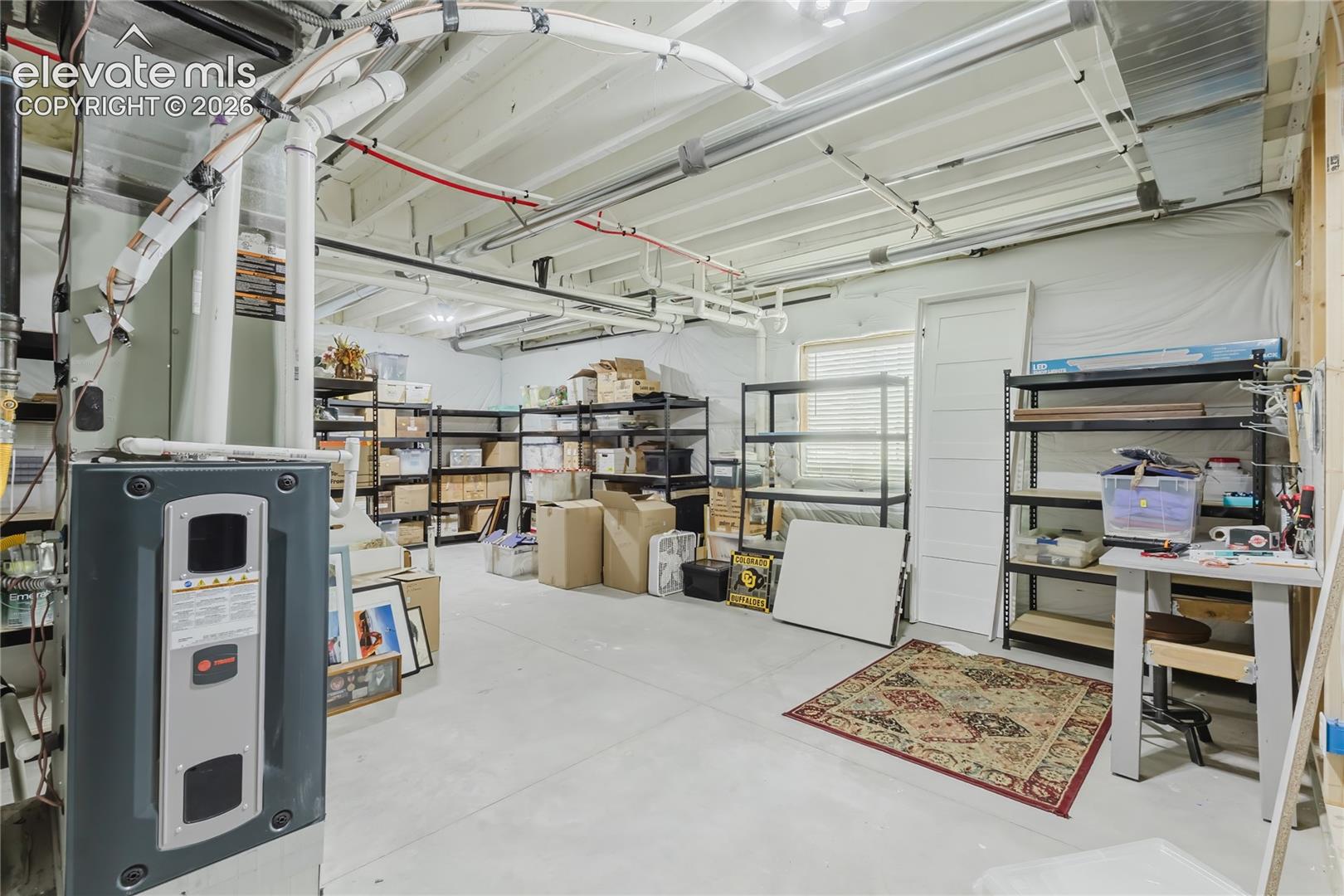 Mechanical room wtih high efficency furnace, passive radon system and on demand hot wter heater
