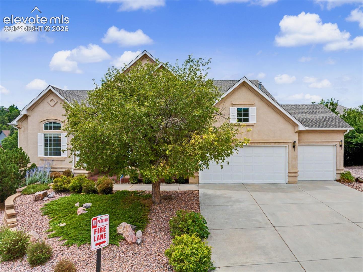 Oversized 3 Car Garage with Access Door!