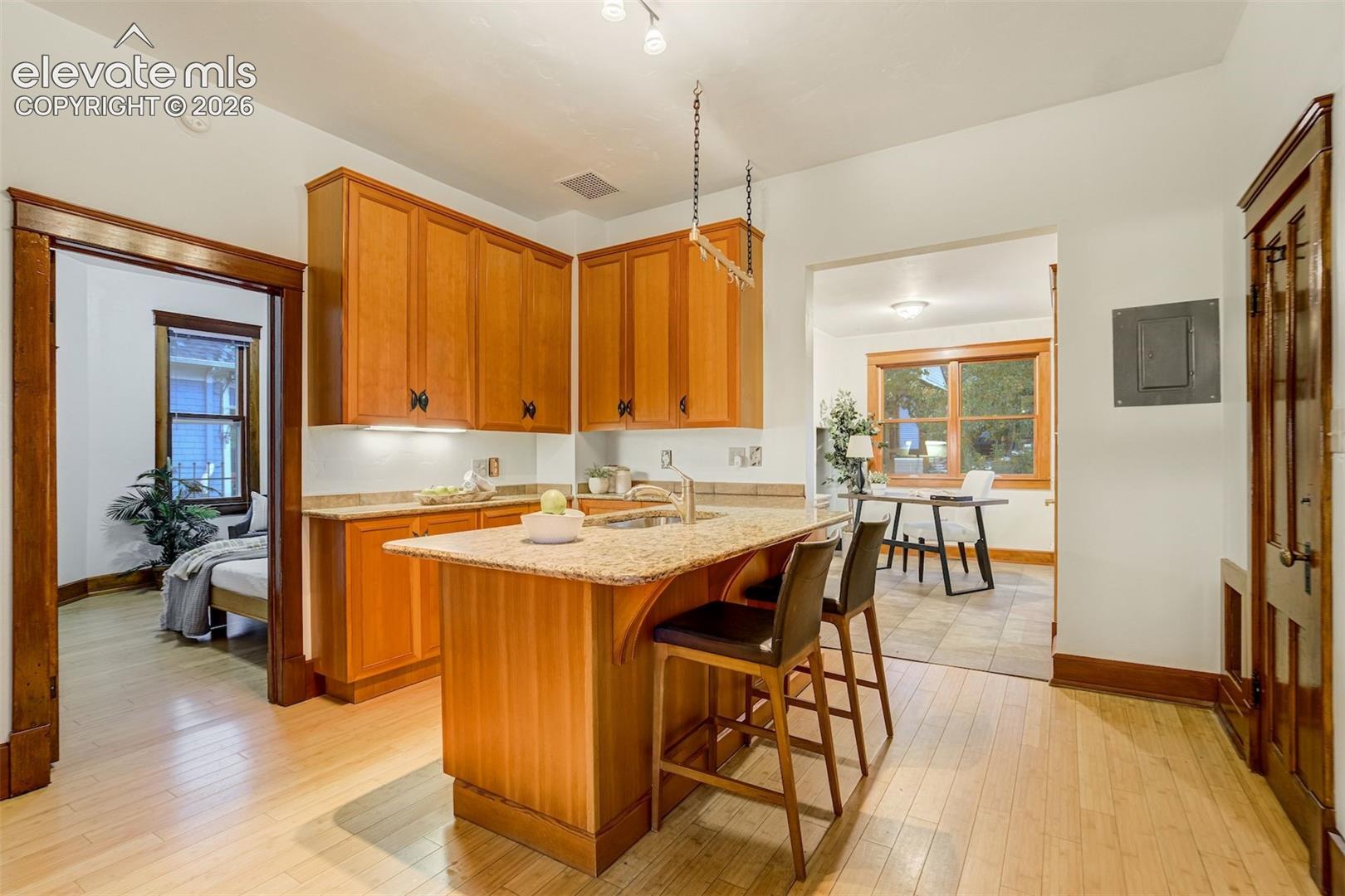Kitchen is very functional with island/bar space