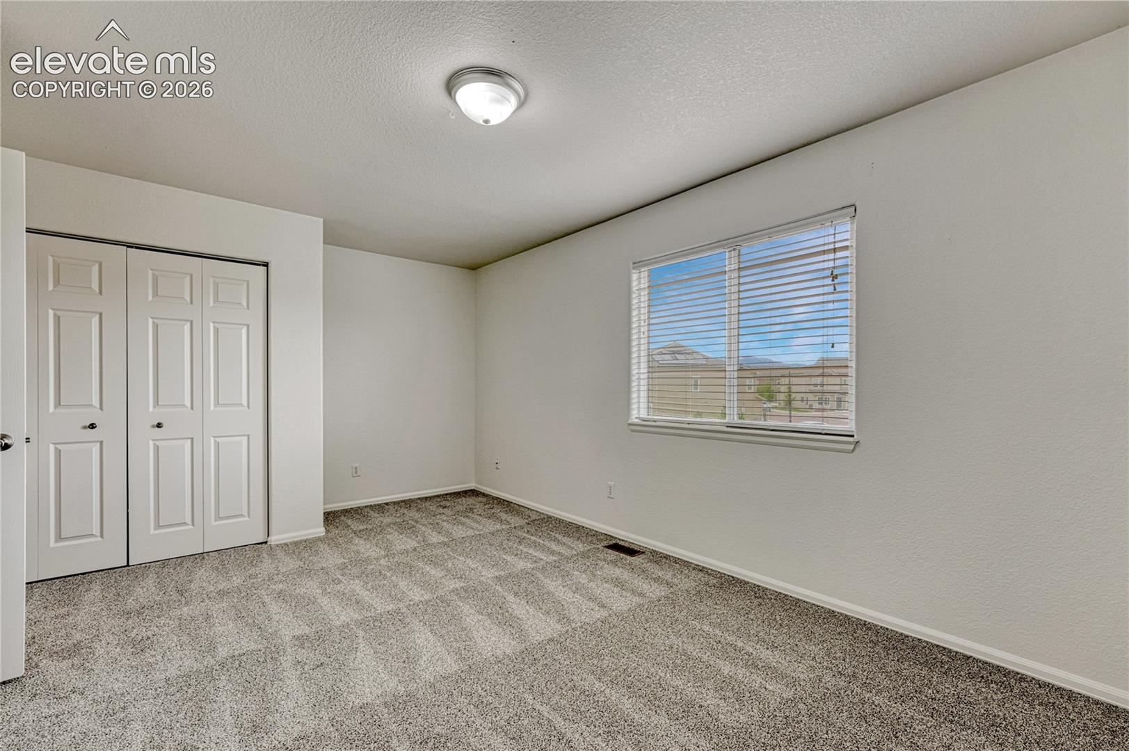 First of two upstairs bedrooms. 