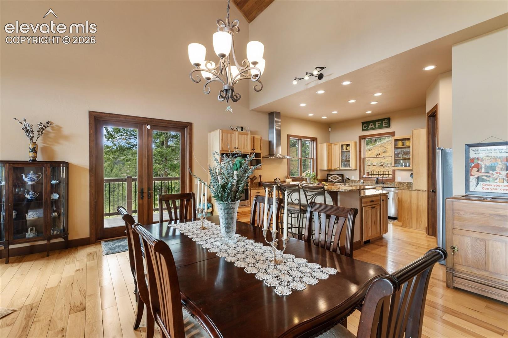 Dining room and kitchen with walkout to porch, 