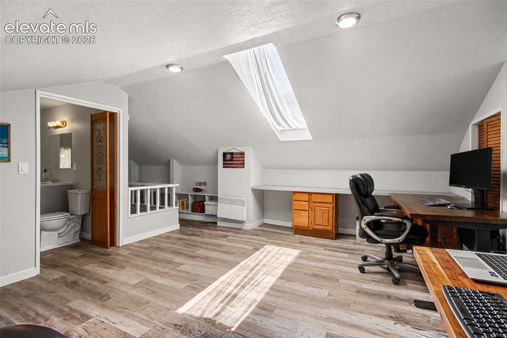 Huge space with skylight and built-ins!