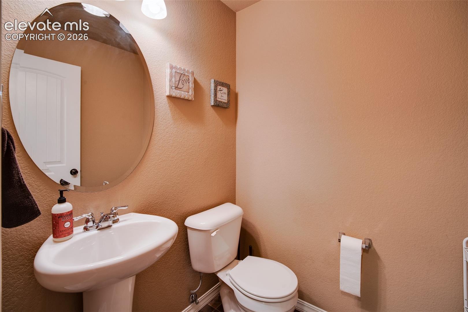 Powder Bathroom with pedestal sink.