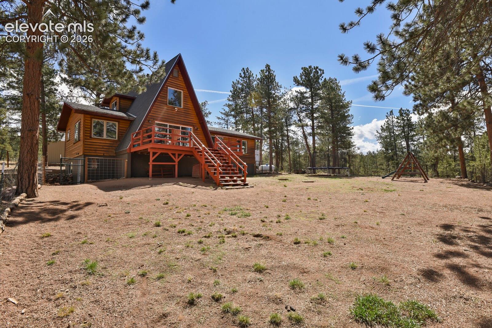 Back of home from fenced area for dogs, kids, play