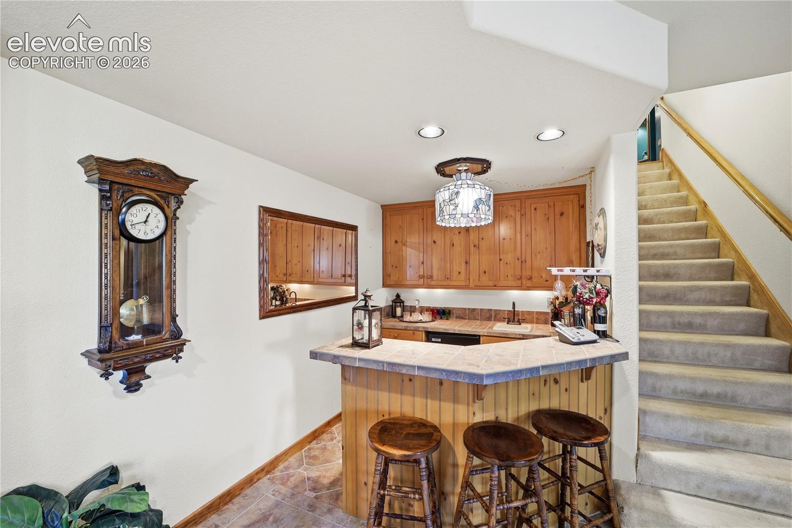 Basement Wet Bar overlooks Family Room